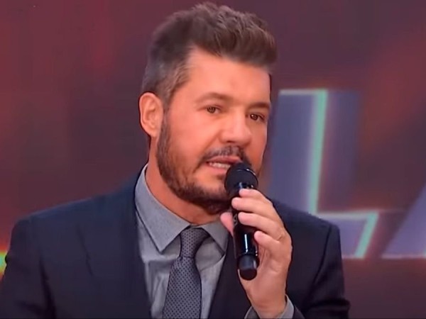 tinelli, deuda, cheques, millones